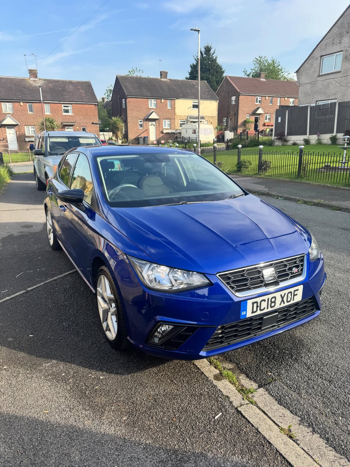 Blue Seat Ibiza FR gleaming after a full exterior safe wash and ceramic protection
